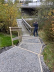 The inspector reviews the work